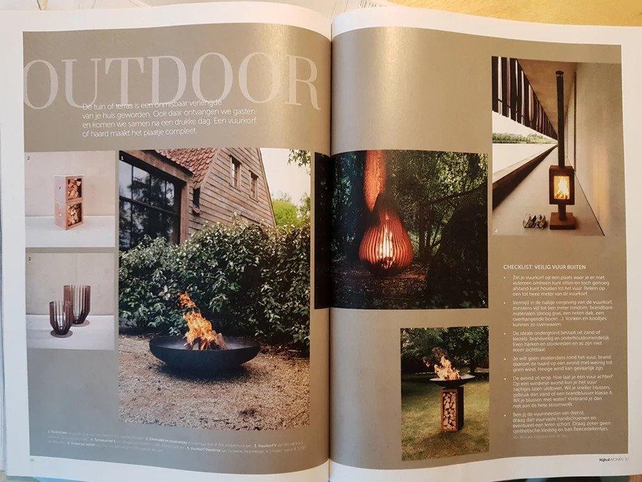 Woodchuck outdoor stoves in a magazine